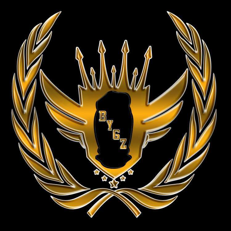 A gold emblem with a crown and the letter b on it