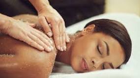 Woman Lays On Table And Gets A Therapeutic Massage In Austin TX