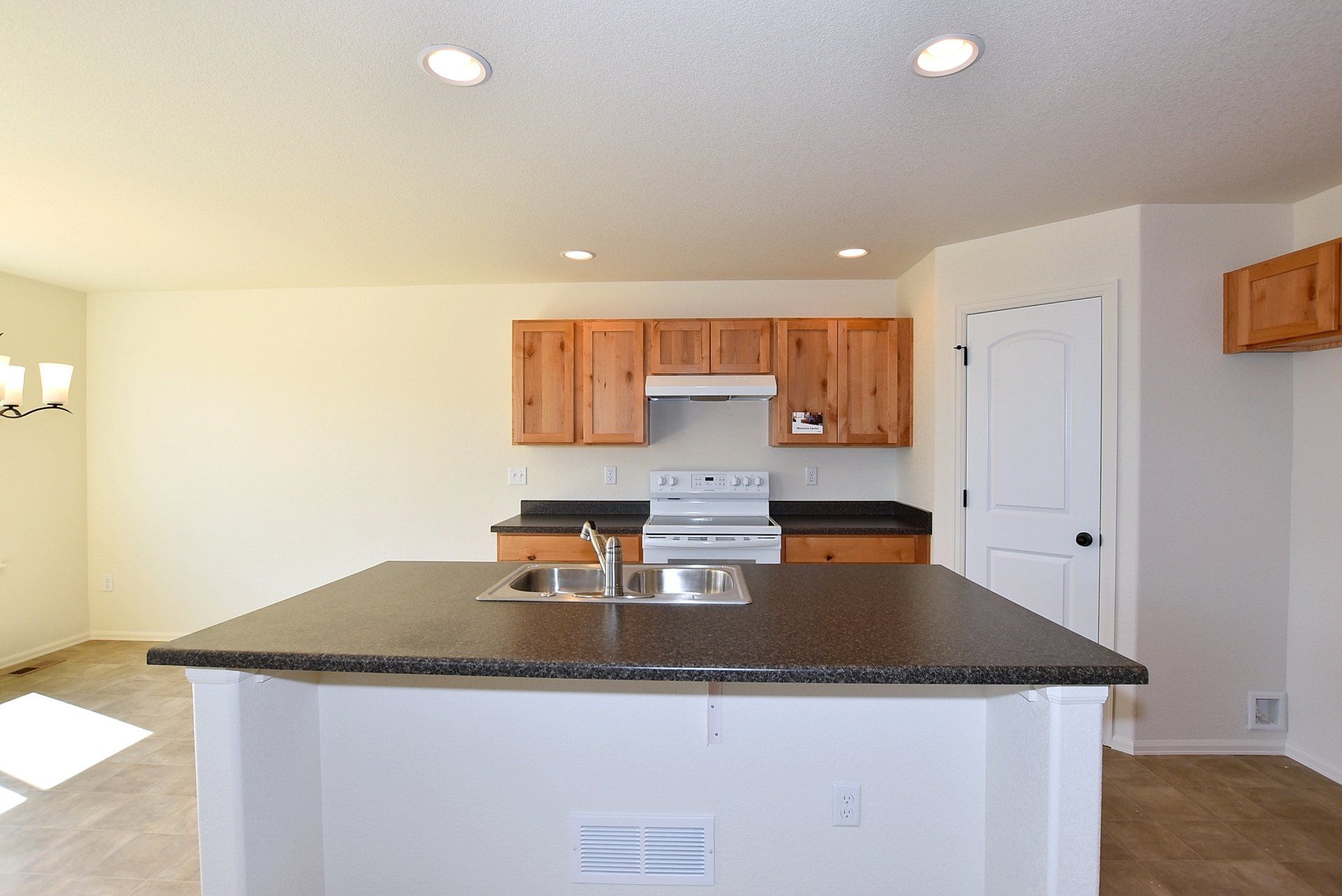 Kitchen with countertop and sink