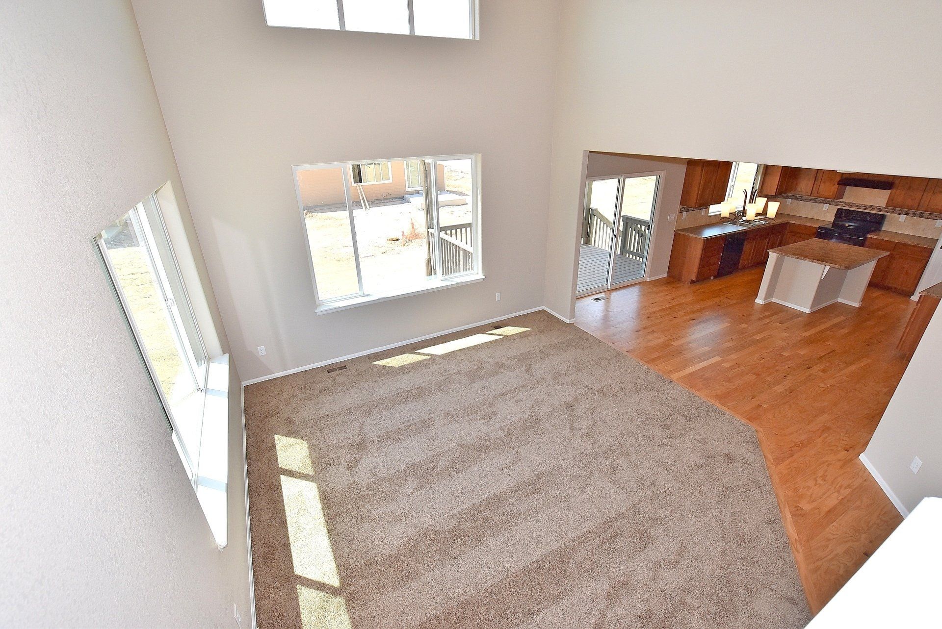 Second story view of family room and kitchen