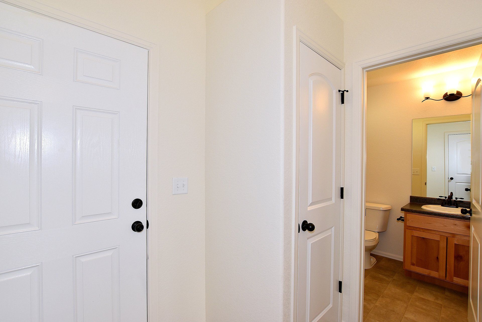 Bathroom with wooden cabinets