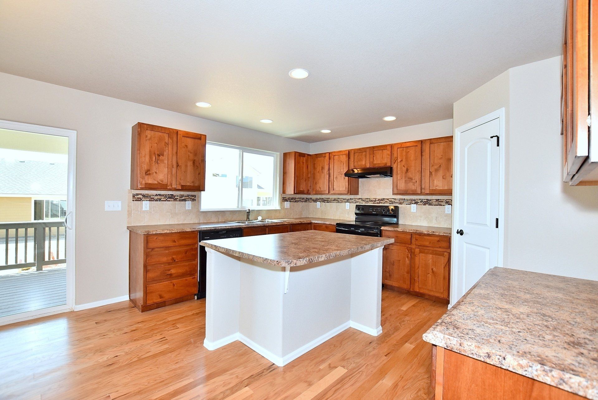 Kitchen with wood floors and island