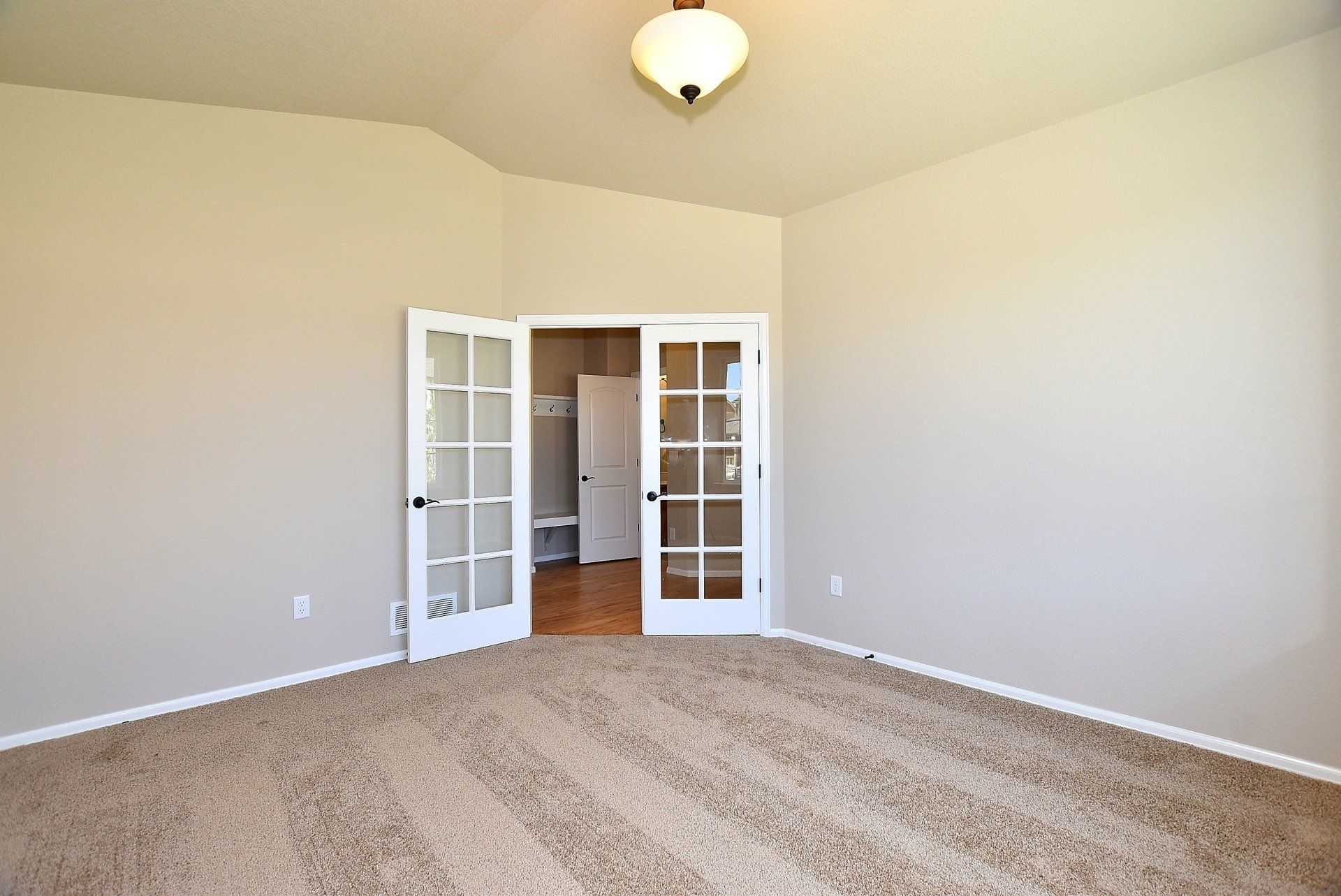 Open room with wooden floors