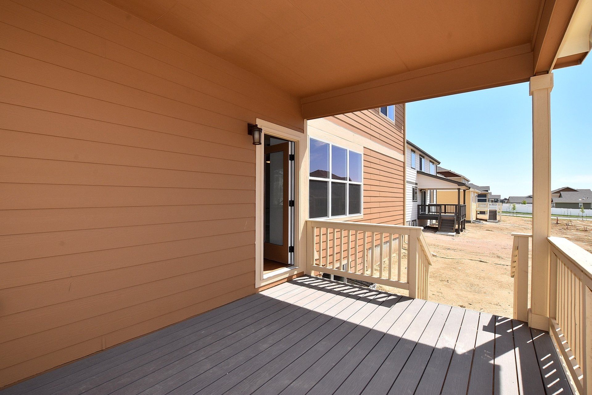 Patio with view of new construction homes