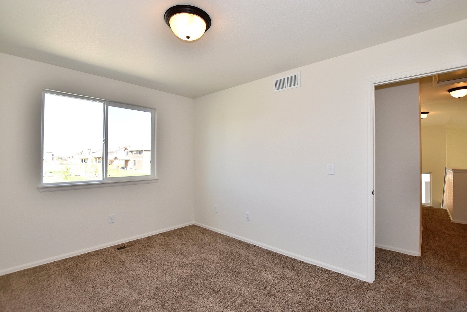 Bedroom with carpet flooring