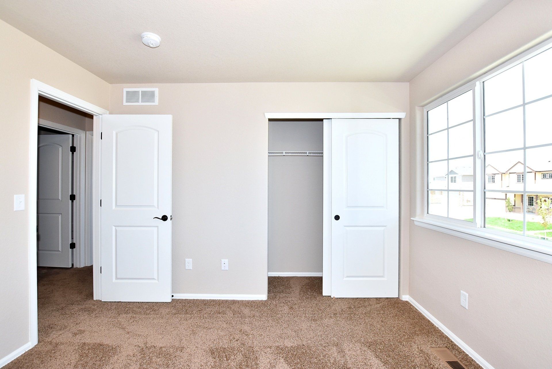 Bedroom with closet doors