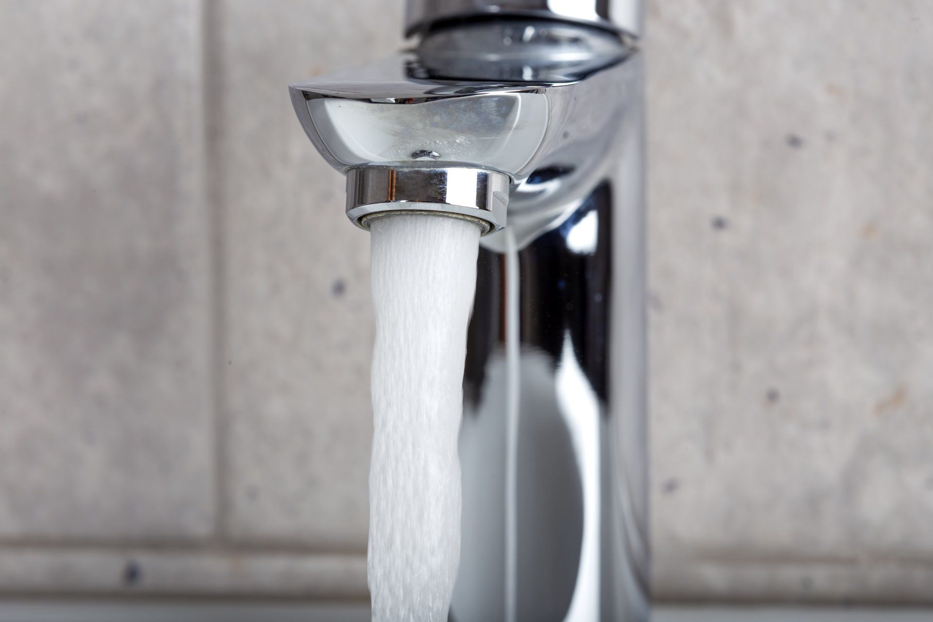 Chrome faucet running water Chrome faucet running water
