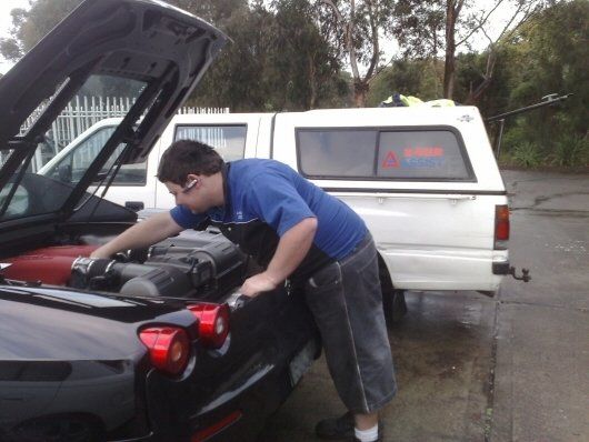 Mechanic Checking Car Engine — Roadside Assistance in Berkley Vale, NSW
