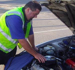 Mechanic Checking Car Engine — Roadside Assistance in Berkley Vale, NSW