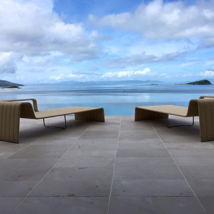 View Of Two Chairs On The Beach With Clean Tile — Total Sealing Works Whitsundays in Cannonvale, QLD