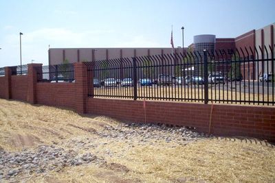 Company Fences — Iron Fences With Brick Wall in Albuquerque, NM Company Fences — Iron Fences With Brick Wall in Albuquerque, NM