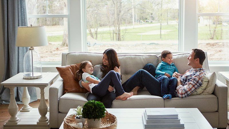 Family Sitting on Couch