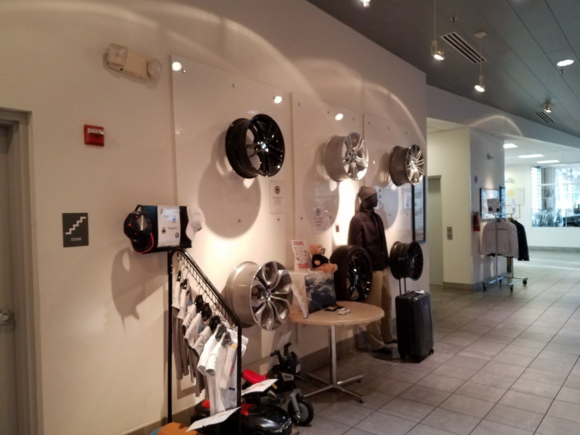 A room with a lot of wheels on the wall