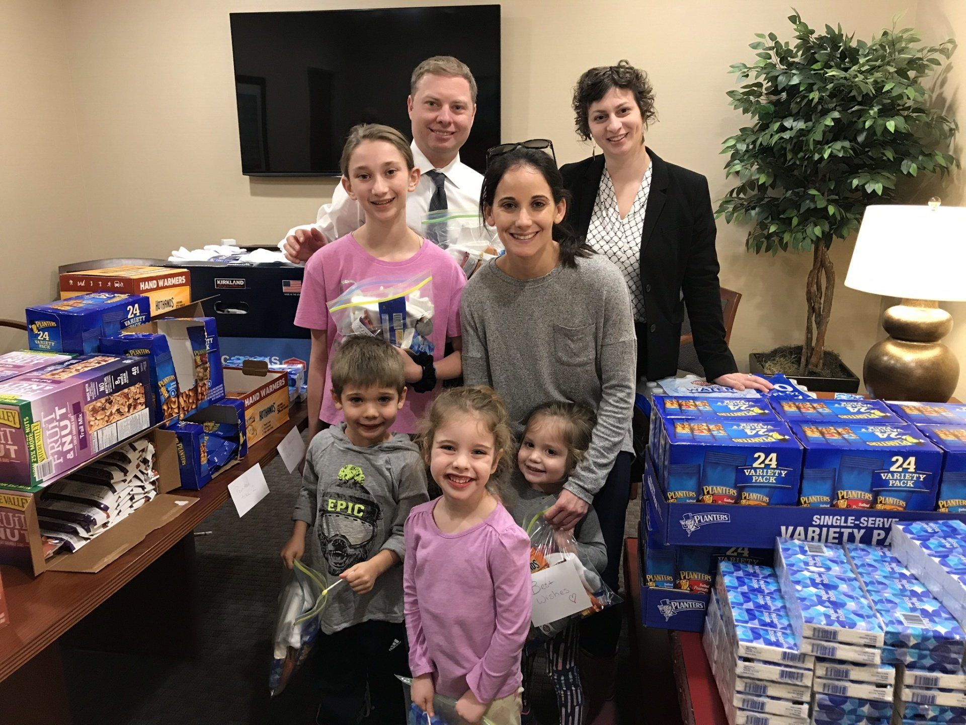 Levinson's employees and their families make blessing bags as part of volunteer initiative