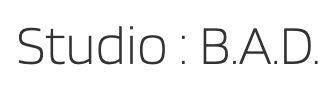 Text logo reading “Studio : B.A.D.” in gray on a white background