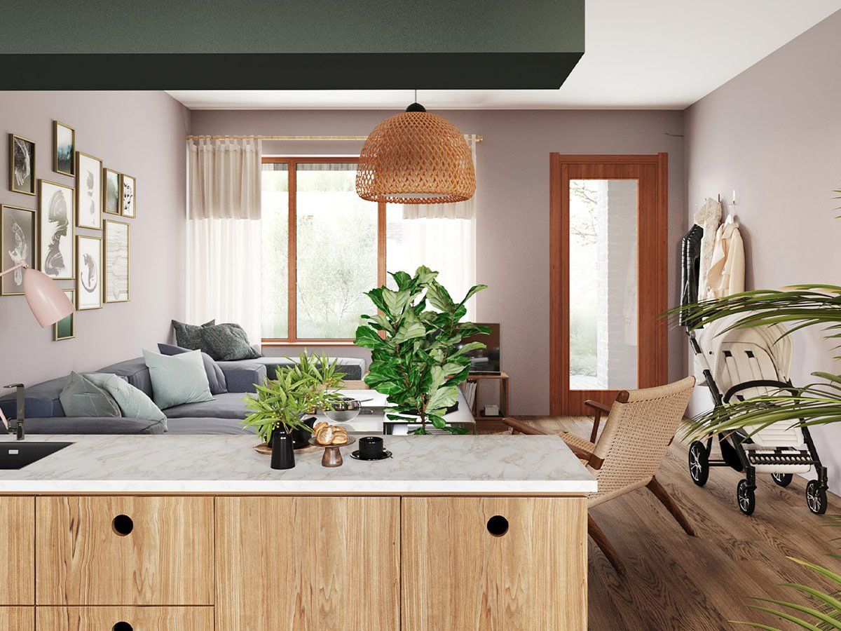Bright living room with gray sofa, wood accents, large window, wicker pendant light, and plants