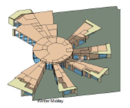 Aerial view of a tan building with a circular center and multiple radiating wings on a green background