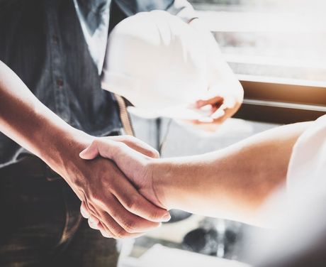 Workers Compensation — Two Men Shaking Hands In Moline, IL Workers Compensation — Two Men Shaking Hands In Moline, IL