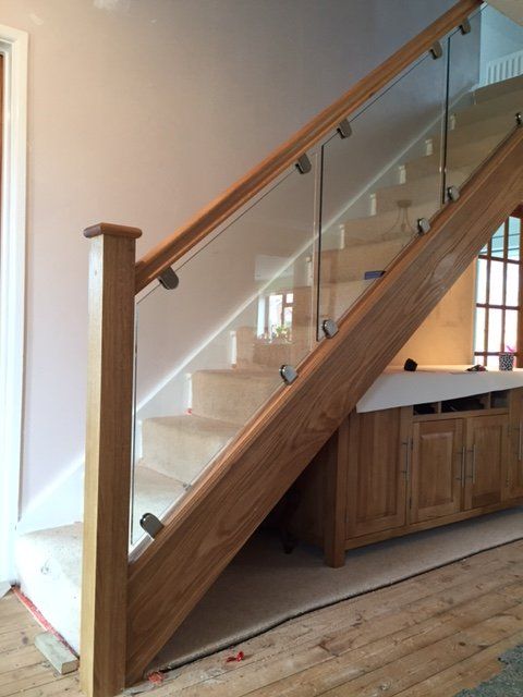 wooden and glass railing