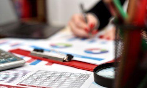 Tax Doctor — Businesswoman Analyzes The Market in Hesperia, CA Tax Doctor — Businesswoman Analyzes The Market in Hesperia, CA