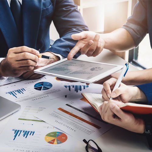 Financial Planning — Accountants Using Tablet And Computer Technology In Analysis in Hesperia, CA