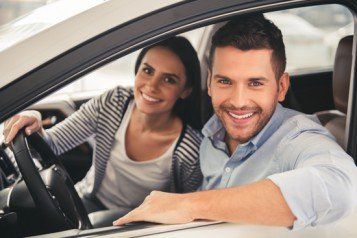 Couple Smiling Inside the Car - Insurance Company in Kingsport, TN Couple Smiling Inside the Car - Insurance Company in Kingsport, TN
