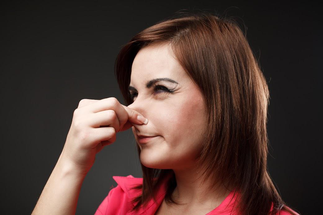 Commercial Janitorial Services Atlanta — Women Covering her Nose in Atlanta, GA