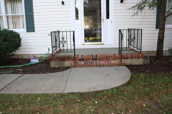 Pressure washing - After (siding steps and walkway) - Maintenance Services in Kendall Park, NJ