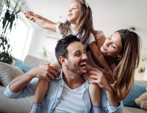 Happy Family In New Home — Fayetteville, NC — Market Value Realty & Appraisal Inc
