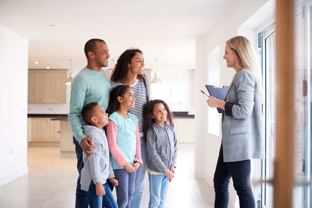 Family Buying New Home — Fayetteville, NC — Market Value Realty & Appraisal Inc Family Buying New Home — Fayetteville, NC — Market Value Realty & Appraisal Inc