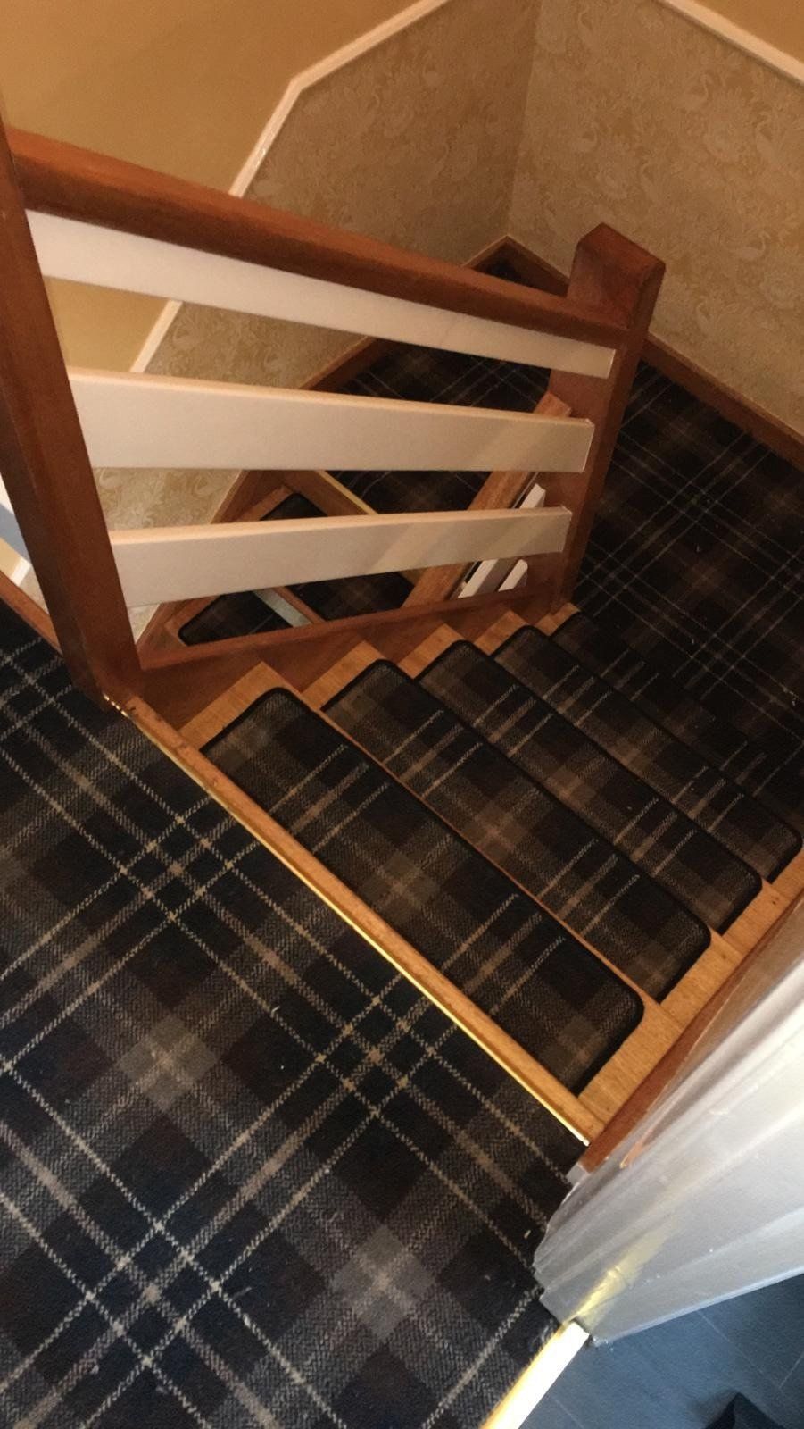 tartan carpet on stairs with bound edges