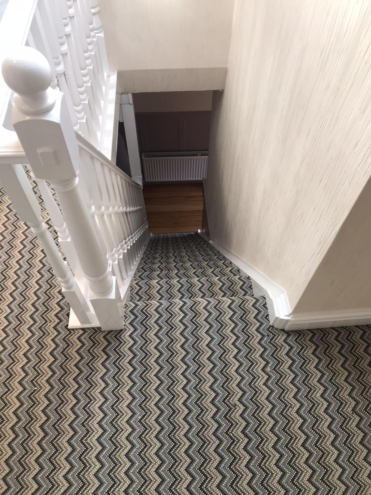 zig zag striped carpet on stairs