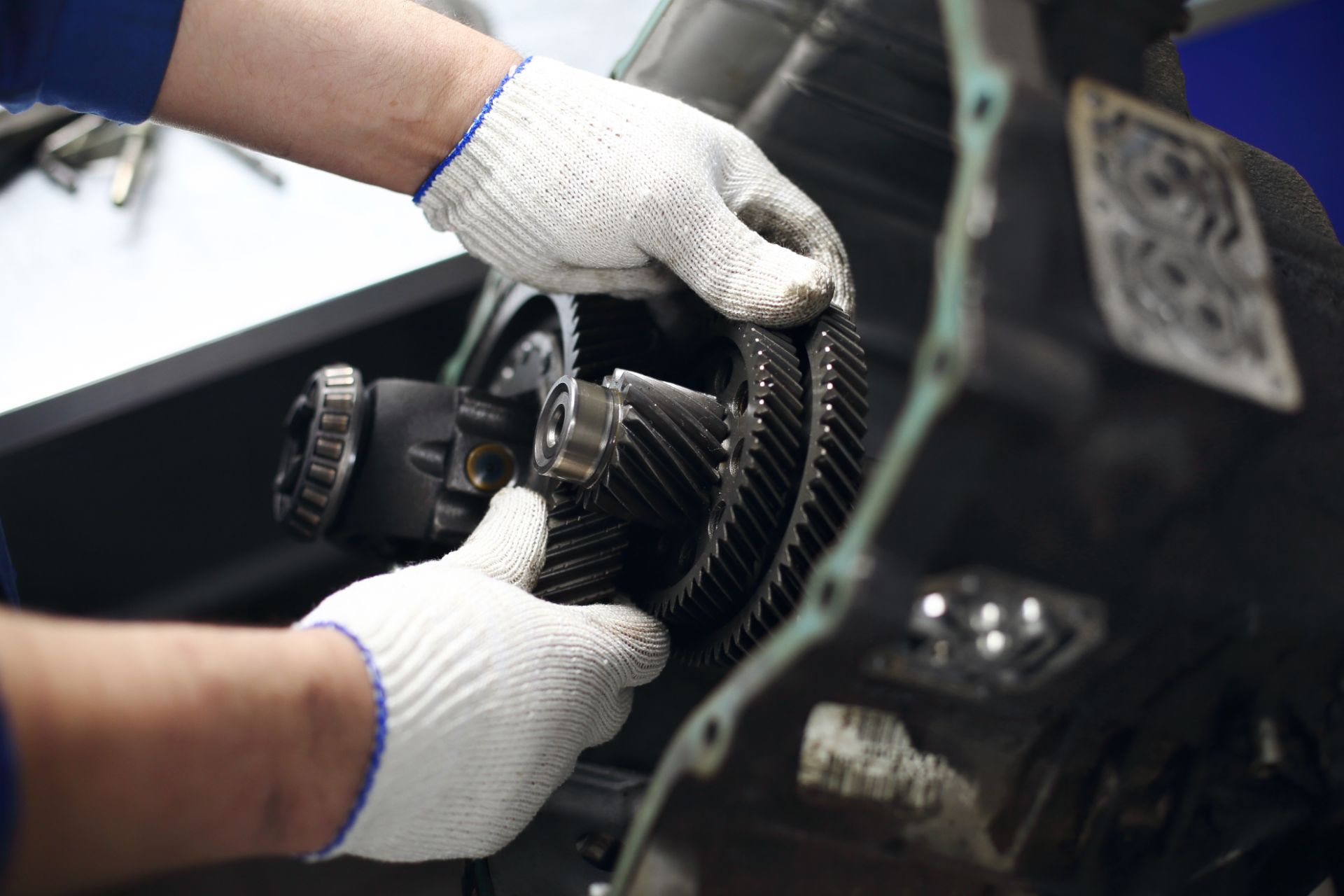 Man performing transmission repair in Lincoln, NE