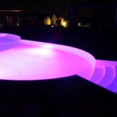 Swimming pool with lighting system