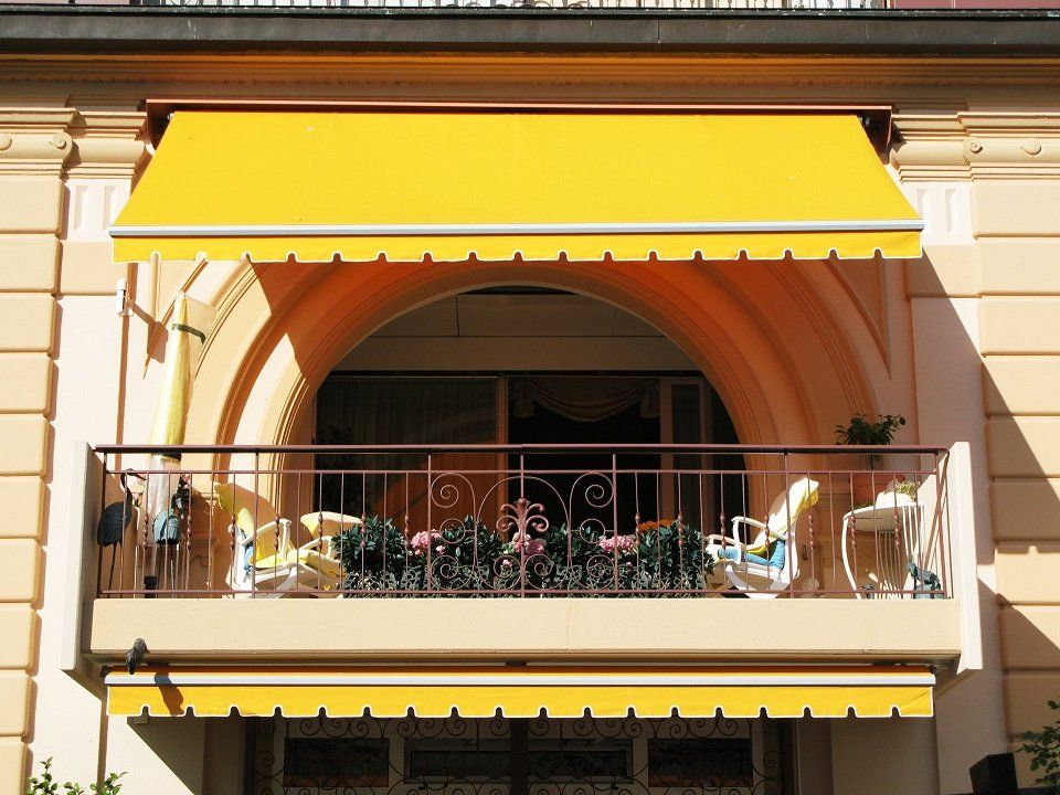 bancone con tenda da sole a braccio
