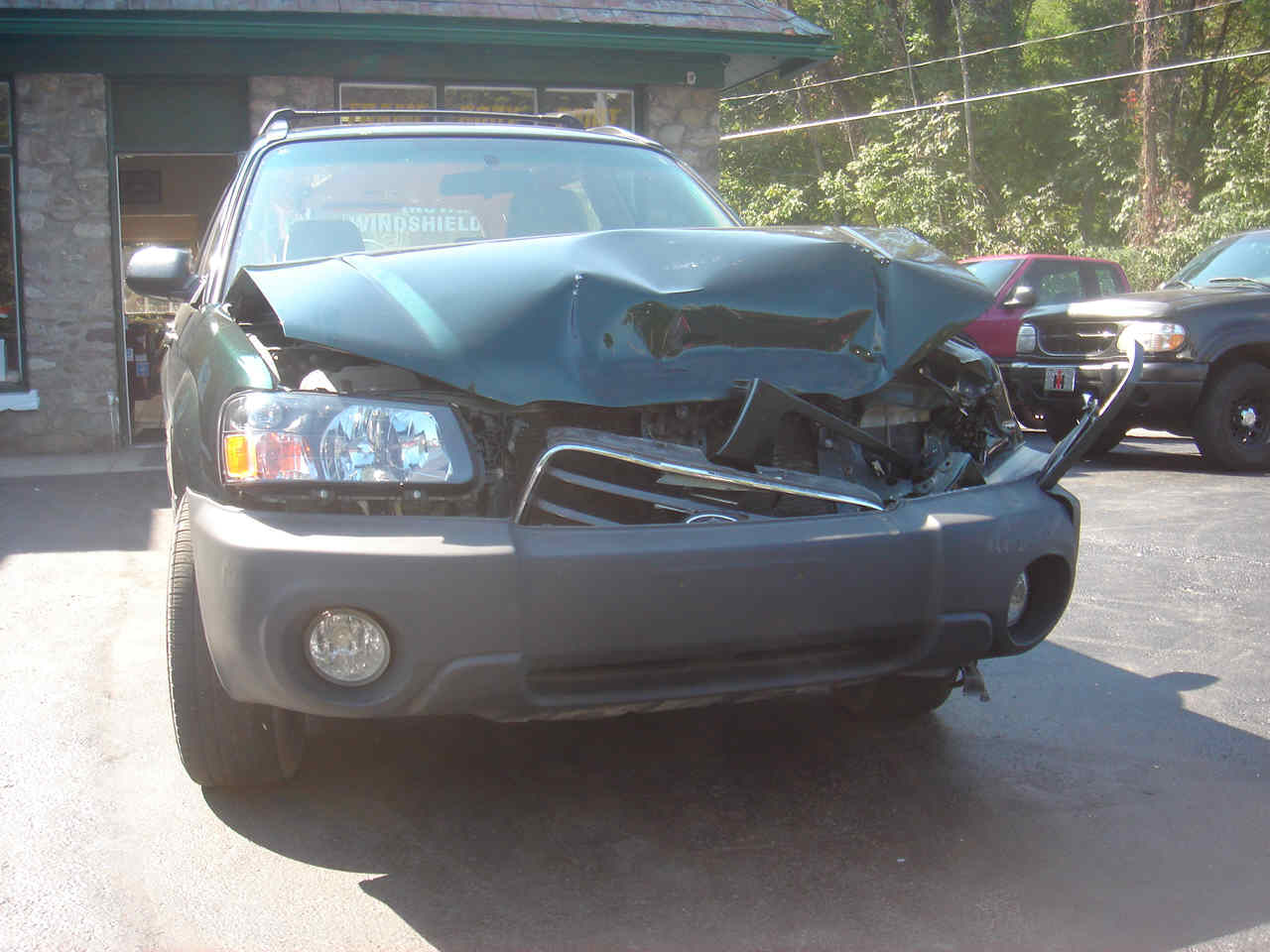 smashed up subaru