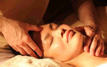 Woman having a cranial sacral therapy — Massage Therapy in Kettering, OH Woman having a cranial sacral therapy — Massage Therapy in Kettering, OH