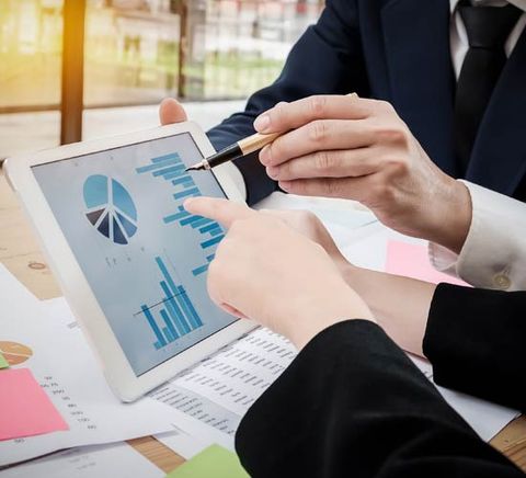 Accountant Discussing a Graph — Ahrens & Associates, S.C. — Appleton, WI Accountant Discussing a Graph — Ahrens & Associates, S.C. — Appleton, WI