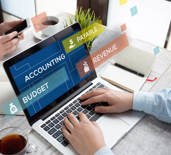 Man Using a Laptop — Ahrens & Associates, S.C. — Appleton, WI