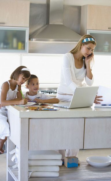 Woman on the phone to one of our Perth kitchen design team