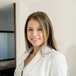 A headshot of a female realtor.