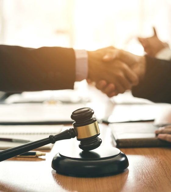 Gavel and Persons Shaking Hands — Naples, FL — The Law Office of Charles R. Hayes, P.A. Gavel and Persons Shaking Hands — Naples, FL — The Law Office of Charles R. Hayes, P.A.