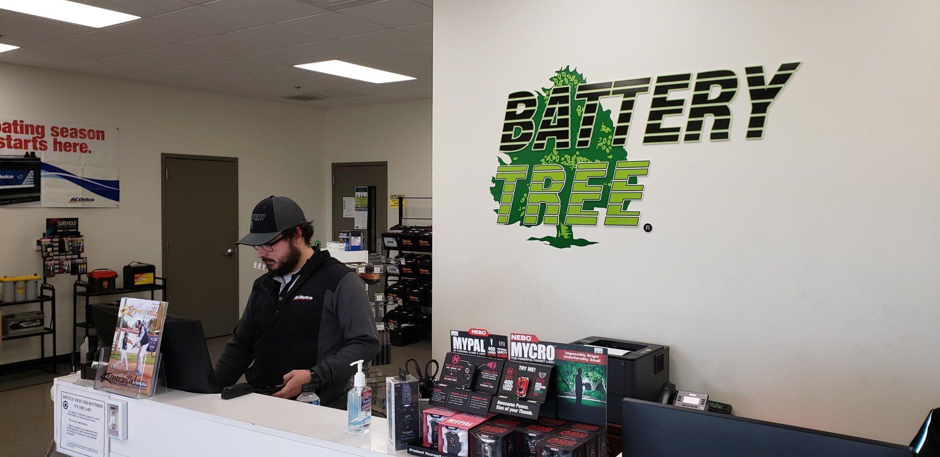 Man at Front Desk ─ Kernersville, NC ─ Battery Tree Man at Front Desk ─ Kernersville, NC ─ Battery Tree