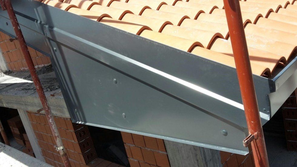 realizzazione e montaggio di grondaie