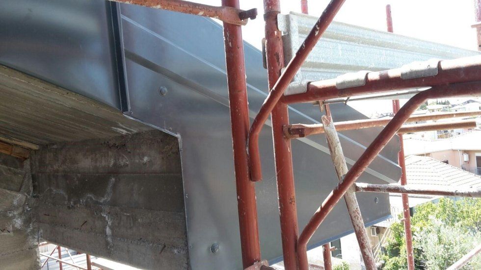realizzazione e montaggio di grondaie