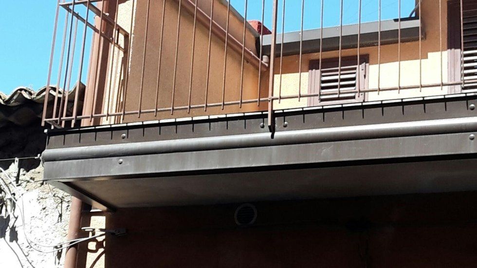 realizzazione e montaggio di grondaie