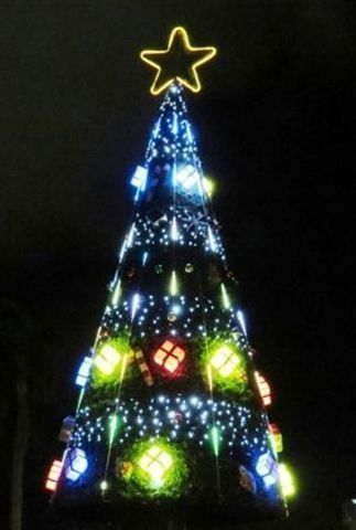Christmas tree glowing blue and yellow