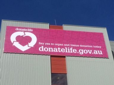 pink banner on building