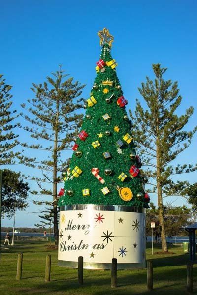 outdoor Christmas tree on white stand