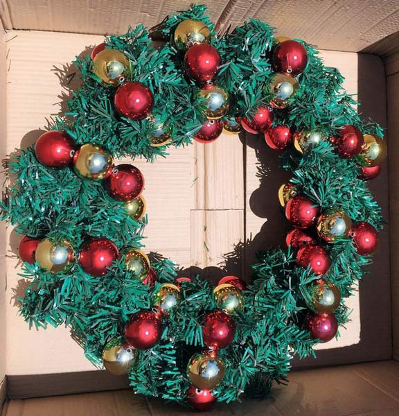 Christmas wreath with red and gold bulbs